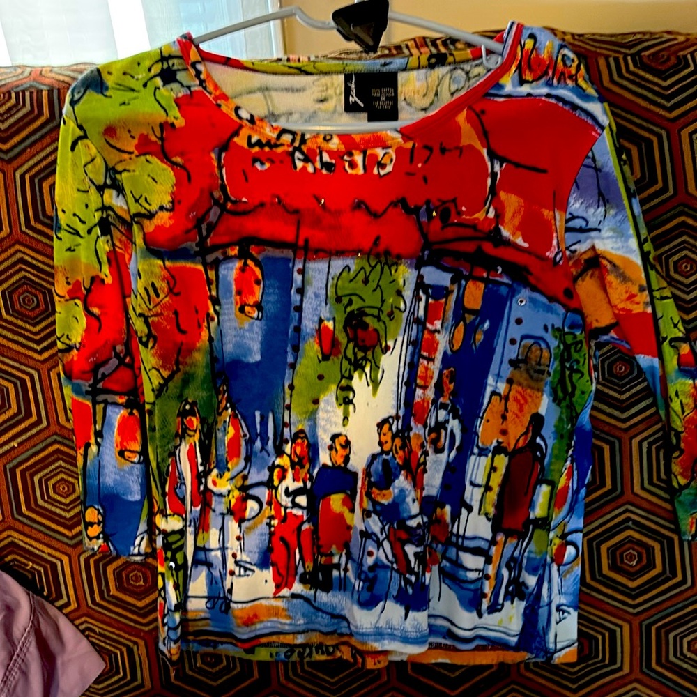 Women’s size medium Zaskin shirt. Beautiful colors..